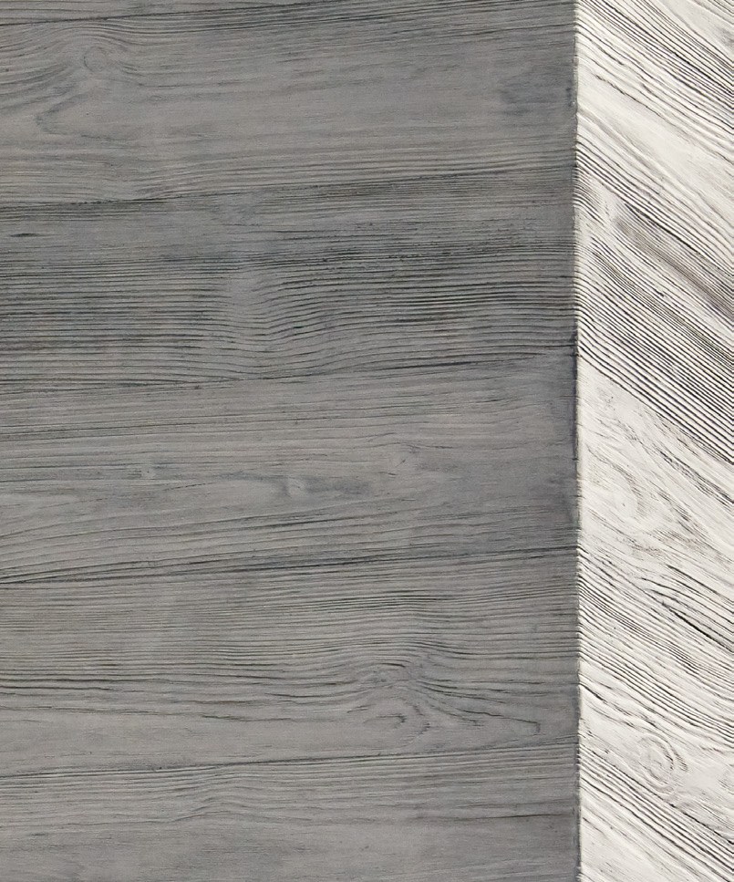 Grey and white StoVeneer Wood boards meeting at an external corner, showing the individual timber grain