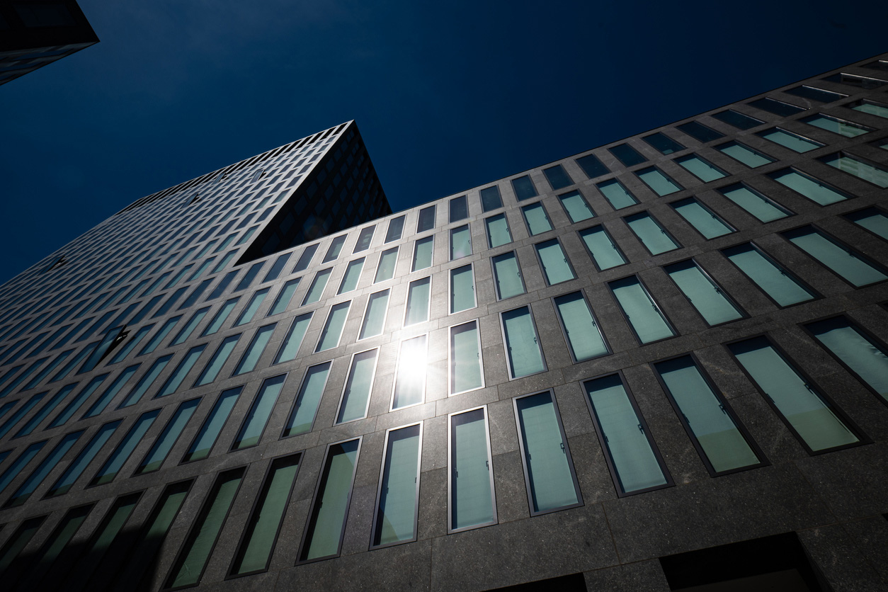 Dark-coloured building facade finished with StoColor X-black heat-reflective paint